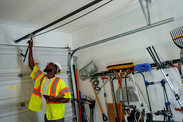 Professional Garage Door Panel Replacement technician working in Clinton, UT